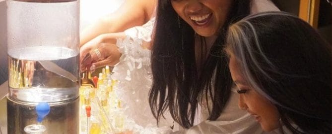 two women mix fragrances happily as part of a DIY Spa Product country club event